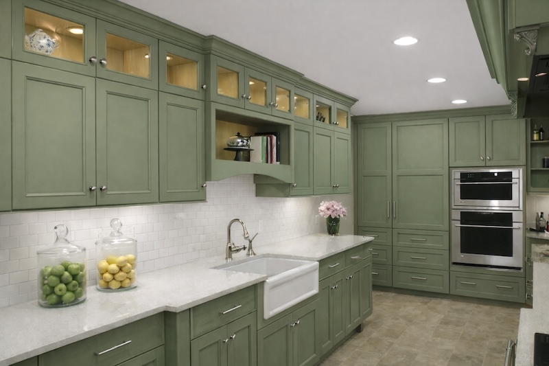 Modernized kitchen with old doors repainted in a Sage Green finish