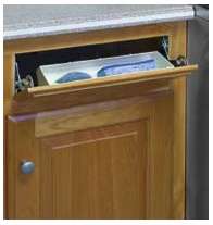 unfinished kitchen cabinet with tilt-out tray