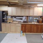 Unfinished cabinets prepped for staining