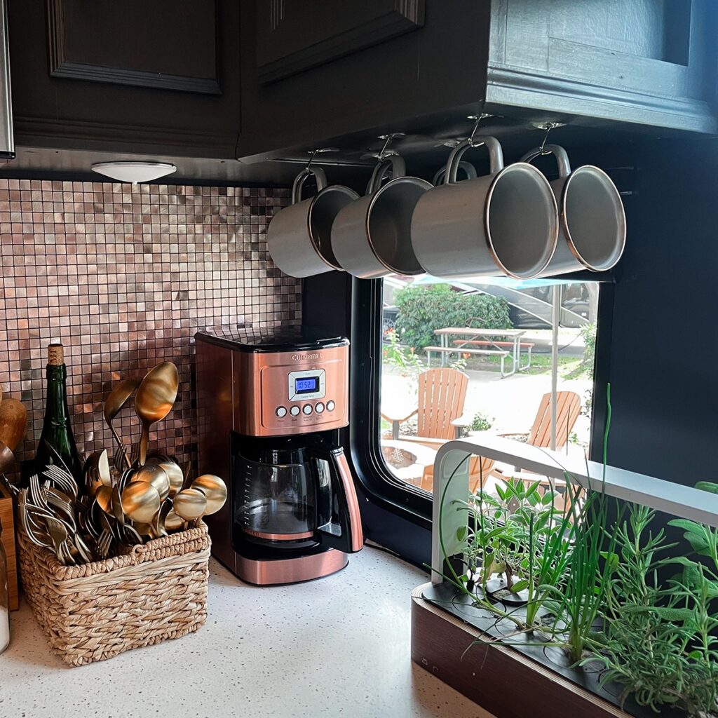 RV kitchen corner with hanging mugs
